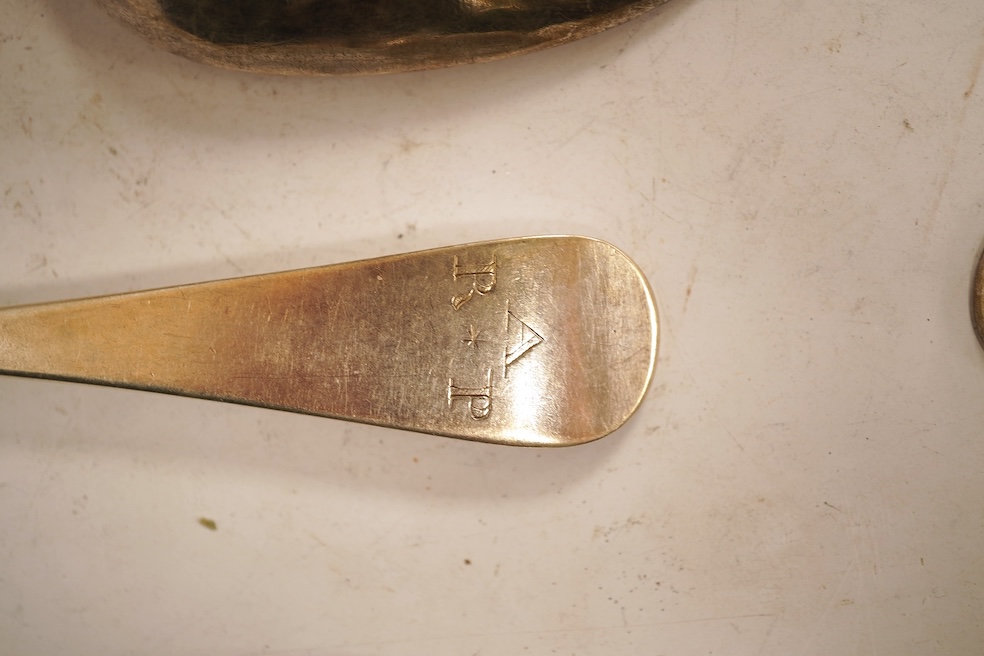 An 18th century Irish? provincial silver Hanoverian pattern tablespoon, maker's mark stamped twice 'I.T with crown above and mullet below' and 'Sterling', 20.9cm, together with eight assorted 18th century silver rat tail